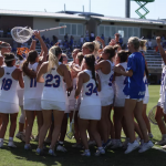 Florida's lacrosse team celebrates after its 11-9 win over Duke in the NCAA Tournament Quarterfinal.